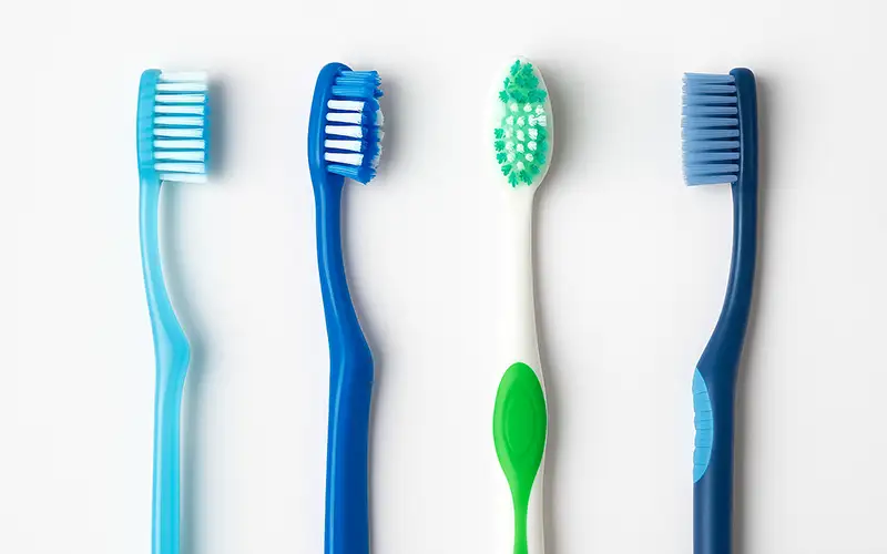 مسواک زدن و نخ دندان کشیدن با براکت ها